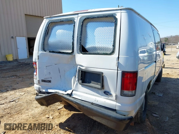 1999 Ford Econoline Cargo with VIN 1FTRE14W0XHB64440, listed as a IAAI auction lot 41645551 with 239,114 mi miles. Bid and sale history available at carsss.com. Image 16.