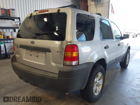 2006 Ford Escape XLT with VIN 1FMCU93126KC12711, listed as a IAAI auction lot 42659618 with 180,611 mi miles and . Bid and sale history available at DreamBid. Image 4.