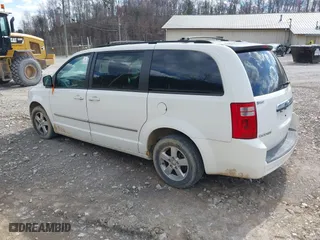 2010 Dodge Grand Caravan SXT with VIN 2D4RN5D12AR120322, listed as a IAAI auction lot 41876293 with 1 mi miles. Bid and sale history available at carsss.com. Image 3.