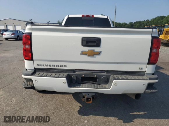 2019 Chevrolet Silverado 3500HD LT with VIN 1GC4KWCY3KF228879, listed as a Copart auction lot 61737005 with 162,401 mi miles and Salvage title. Bid and sale history available at DreamBid. Image 6.