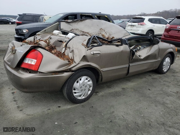 2000 Mazda Protege DX with VIN JM1BJ2226Y0296668, listed as a Copart auction lot 81571624 with 224,376 mi miles and Salvage Title. Bid and sale history available at carsss.com. Image 3.