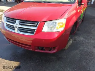 2009 Dodge Grand Caravan SXT with VIN 2D8HN54X99R524373, listed as a IAAI auction lot 41886225 with 124,590 mi miles. Bid and sale history available at carsss.com. Image 6.