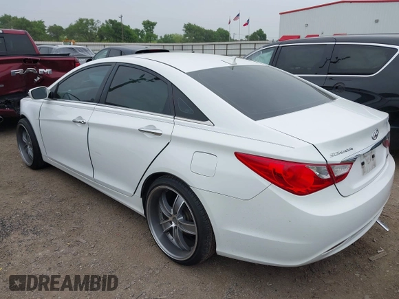 2013 Hyundai Sonata Limited with VIN 5NPEC4AC4DH663707, listed as a IAAI auction lot 41922352 with 165,101 mi miles and . Bid and sale history available at DreamBid. Image 3.