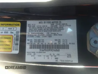 2015 Ford Fusion S Hybrid with VIN 3FA6P0UU9FR246868, listed as a IAAI auction lot 41307984 with 153,466 mi miles. Bid and sale history available at carsss.com. Image 9.