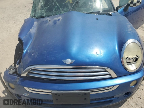 2006 MINI Hardtop with VIN WMWRC33566TK15023, listed as a Copart auction lot 76392014 with Not provided miles and Salvage title. Bid and sale history available at DreamBid. Image 12.