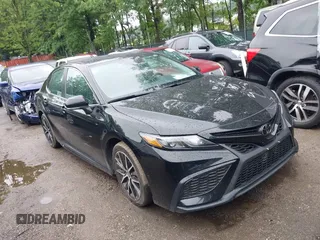 2023 Toyota Camry SE z VIN 4T1G11AK2PU152149, wystawiony jako IAAI lot #42513944 z przebiegiem 37 700 mil mil oraz . Historia ofert i sprzedaży dostępna na DreamBid. Obrazek 1.