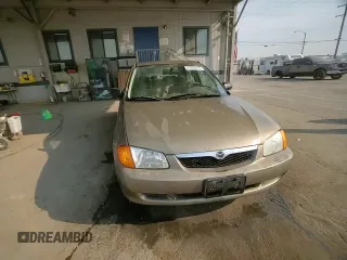 1999 Mazda Protege DX z VIN JM1BJ2223X0137153, wystawiony jako Copart lot #87899735 z przebiegiem 154 209 mil mil oraz Szkoda całkowita • Salvage title. Historia ofert i sprzedaży dostępna na DreamBid. Obrazek 10.