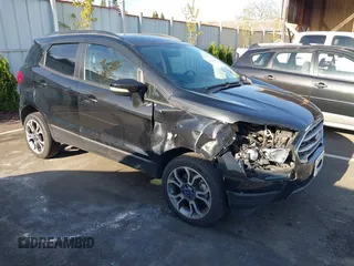 2018 Ford EcoSport SE z VIN MAJ6P1UL2JC218107, wystawiony jako IAAI lot #42042456 z przebiegiem 87 436 mil mil oraz . Historia ofert i sprzedaży dostępna na DreamBid. Obrazek 1.