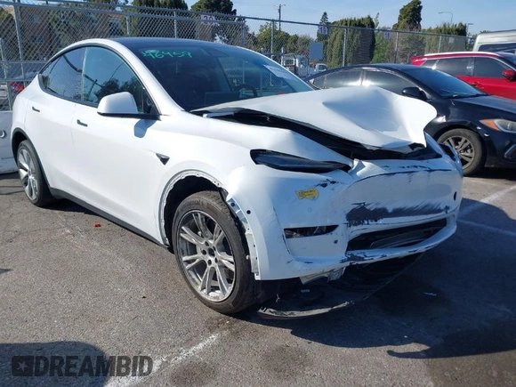 2022 Tesla Model Y Long Range z VIN 7SAYGDEE8NF374636, wystawiony jako IAAI lot #41545669 z przebiegiem 41 965 mil mil oraz . Historia ofert i sprzedaży dostępna na DreamBid. Obrazek 1.