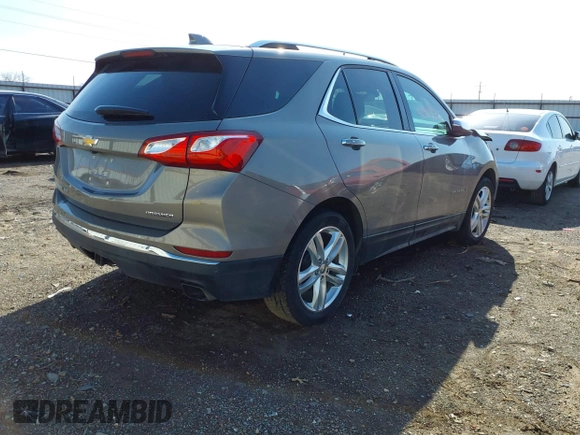 2019 Chevrolet Equinox Premier with VIN 3GNAXPEX0KS551658, listed as a IAAI auction lot 41908227 with 49,535 mi miles and . Bid and sale history available at DreamBid. Image 4.