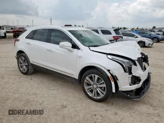 2024 Cadillac XT5 FWD Premium Luxury with VIN 1GYKNCRS9RZ706158, listed as a Copart auction lot 60455055 with 7,999 mi miles and Salvage title. Bid and sale history available at DreamBid. Image 4.