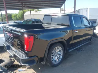 2019 GMC Sierra 1500 Denali z VIN 1GTU9FEL8KZ173809, wystawiony jako IAAI lot #42363300 z przebiegiem 75 425 mil mil oraz . Historia ofert i sprzedaży dostępna na DreamBid. Obrazek 4.