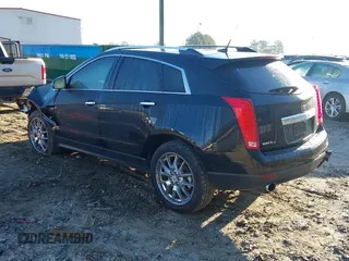 2013 Cadillac SRX Performance Collection with VIN 3GYFNHE31DS594457, listed as a IAAI auction lot 41145250 with 131,395 mi miles. Bid and sale history available at carsss.com. Image 3.