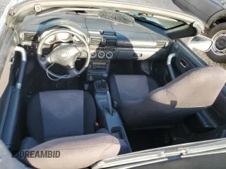 2001 Toyota MR2 z VIN JTDFR320410036287, wystawiony jako Copart lot #73851984 z przebiegiem Nie podano mil oraz Szkody całkowita. Historia ofert i sprzedaży dostępna na DreamBid. Obrazek 8.