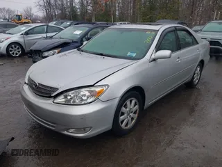 2004 Toyota Camry LE with VIN 4T1BF30K14U578385, listed as a IAAI auction lot 41547709 with 217,434 mi miles. Bid and sale history available at carsss.com. Image 2.