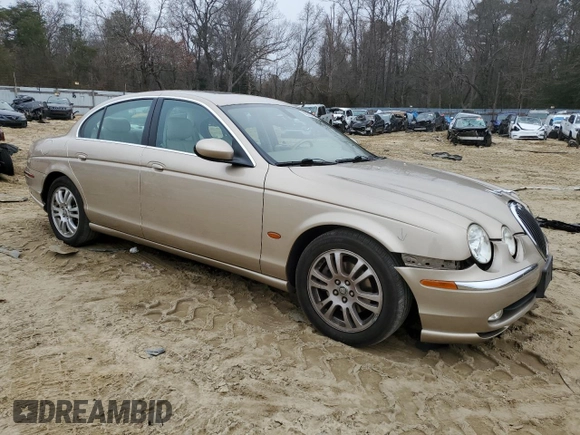 2003 Jaguar S-Type z VIN SAJEA01U33HM71782, wystawiony jako Copart lot #82969304 z przebiegiem 127 176 mil mil oraz Szkody całkowita. Historia ofert i sprzedaży dostępna na DreamBid. Obrazek 4.