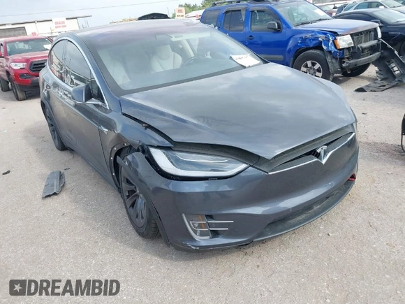 2018 Tesla Model X 75D with VIN 5YJXCDE21JF139712, listed as a IAAI auction lot 41905326 with Not Provided miles and . Bid and sale history available at carsss.com. Image 1.