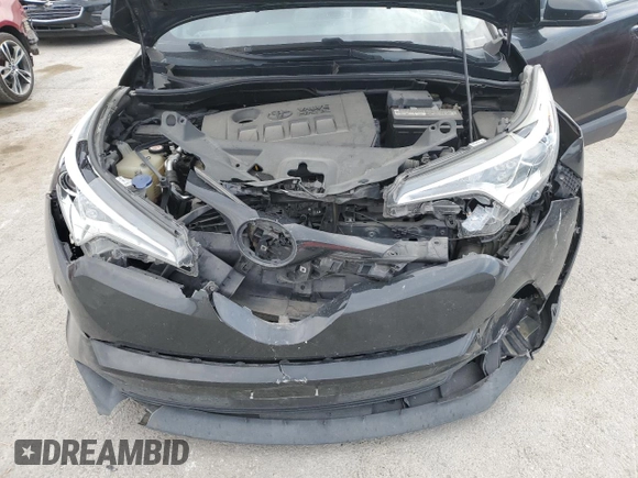 2018 Toyota C-HR XLE z VIN NMTKHMBX2JR036806, wystawiony jako Copart lot #53466255 z przebiegiem 66 915 mil mil oraz Szkoda całkowita • Salvage title. Historia ofert i sprzedaży dostępna na DreamBid. Obrazek 14.