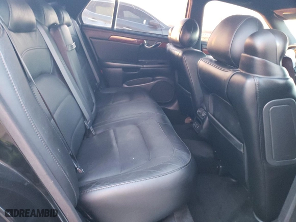 2005 Cadillac DeVille with VIN 1G6KD54Y45U165109, listed as a Copart auction lot 84695674 with 92,569 mi miles and Salvage Title. Bid and sale history available at carsss.com. Image 10.