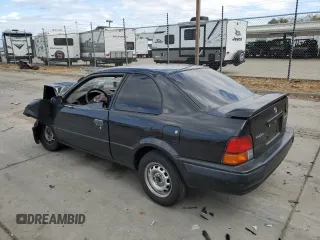 1996 Toyota Tercel DX z VIN JT2AC52LXT0157984, wystawiony jako Copart lot #76524974 z przebiegiem Nie podano mil oraz Szkody całkowita. Historia ofert i sprzedaży dostępna na DreamBid. Obrazek 2.