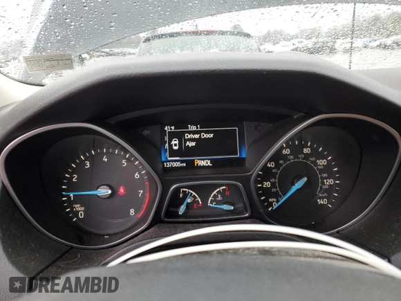 2017 Ford Focus SE with VIN 1FADP3F2XHL316724, listed as a Copart auction lot 52321155 with 137,005 mi miles and Salvage Title. Bid and sale history available at DreamBid. Image 9.