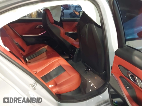 2023 BMW M3 Competition xDrive with VIN WBS43AY03PFP13218, listed as a IAAI auction lot 40936588 with 26,610 mi miles and . Bid and sale history available at DreamBid. Image 8.