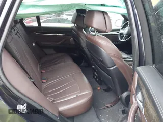 2015 BMW X5 xDrive35i z VIN 5UXKR0C59F0K65982, wystawiony jako IAAI lot #41827942 z przebiegiem 81 019 mil mil oraz . Historia ofert i sprzedaży dostępna na DreamBid. Obrazek 8.
