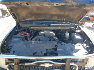 2011 Chevrolet Silverado 1500 LT with VIN 3GCPKSE33BG320029, listed as a IAAI auction lot 41805671 with 110,000 mi miles. Bid and sale history available at carsss.com. Image 10.