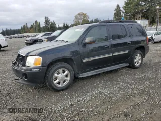 2003 GMC Envoy XL SLT with VIN 1GKES16S036191987, listed as a Copart auction lot 76776604 with 253,889 mi miles and Salvage Title. Bid and sale history available at carsss.com. Image 1.