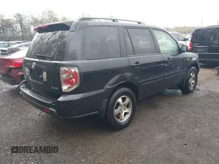 2006 Honda Pilot EX-L with VIN 5FNYF18776B021690, listed as a IAAI auction lot 42016219 with 239,666 mi miles and . Bid and sale history available at DreamBid. Image 4.