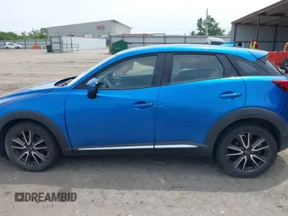 2016 Mazda CX-3 Grand Touring z VIN JM1DKFD78G0134173, wystawiony jako IAAI lot #42179942 z przebiegiem 93 539 mil mil oraz . Historia ofert i sprzedaży dostępna na DreamBid. Obrazek 15.
