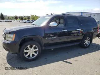 2007 Chevrolet Suburban LTZ z VIN 3GNFC16097G154329, wystawiony jako Copart lot #58562345 z przebiegiem 216 790 mil mil oraz Czysty tytuł • Clean title. Historia ofert i sprzedaży dostępna na DreamBid. Obrazek 1.