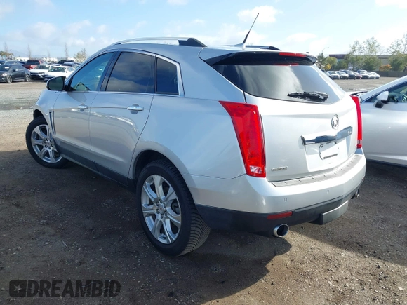 2014 Cadillac SRX Performance Collection with VIN 3GYFNCE39ES544135, listed as a IAAI auction lot 41808644 with 145,772 mi miles and . Bid and sale history available at carsss.com. Image 3.
