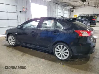 2010 Mitsubishi Lancer GTS with VIN JA32X8HW7AU001795, listed as a Copart auction lot 68226064 with 144,272 mi miles and Salvage Title. Bid and sale history available at carsss.com. Image 2.