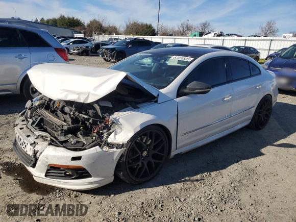 2011 Volkswagen CC Executive 4Motion with VIN WVWGU7AN4BE717092, listed as a Copart auction lot 87826505 with 112,238 mi miles and Salvage Title. Bid and sale history available at carsss.com. Image 1.