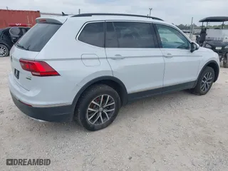 2018 Volkswagen Tiguan SEL with VIN 3VV2B7AX1JM006316, listed as a IAAI auction lot 40084803 with 91,459 mi miles. Bid and sale history available at carsss.com. Image 4.