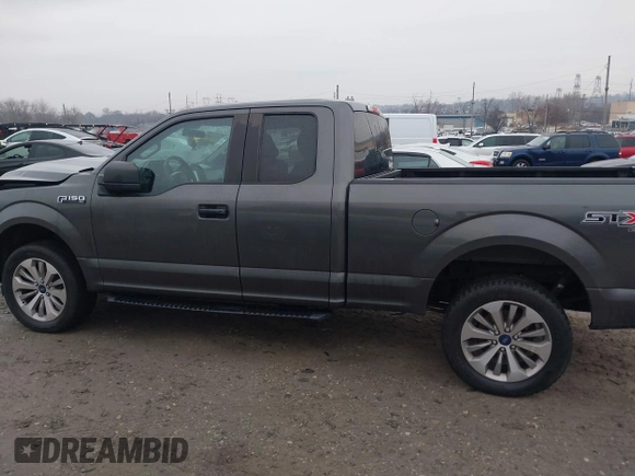 2017 Ford F-150 XL z VIN 1FTFX1EFXHKE03394, wystawiony jako IAAI lot #41471000 z przebiegiem 217 333 mil mil oraz . Historia ofert i sprzedaży dostępna na DreamBid. Obrazek 14.