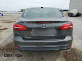 2017 Ford Focus S z VIN 1FADP3E21HL304026, wystawiony jako Copart lot #58786875 z przebiegiem 68 092 mil mil oraz Szkoda całkowita • Salvage title. Historia ofert i sprzedaży dostępna na DreamBid. Obrazek 6.