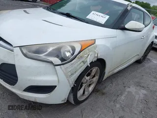 2013 Hyundai Veloster w/Black Int с VIN KMHTC6AD9DU155259, выставлен на аукционе IAAI как лот 42361365 с пробегом 261 896 миль миль и . История ставок и продаж доступна на DreamBid. Изображение 12.