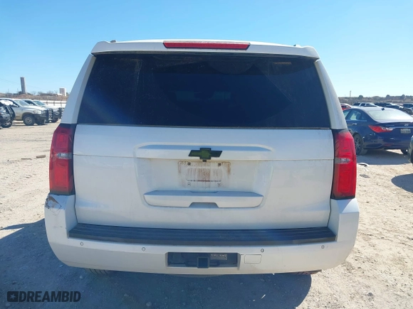 2018 Chevrolet Tahoe LT with VIN 1GNSCBKC8JR128476, listed as a IAAI auction lot 41447799 with 105,209 mi miles. Bid and sale history available at carsss.com. Image 16.