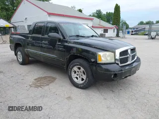 2006 Dodge Dakota SLT with VIN 1D7HW48N36S503257, listed as a IAAI auction lot 42702889 with 124,153 mi miles and . Bid and sale history available at DreamBid. Image 1.