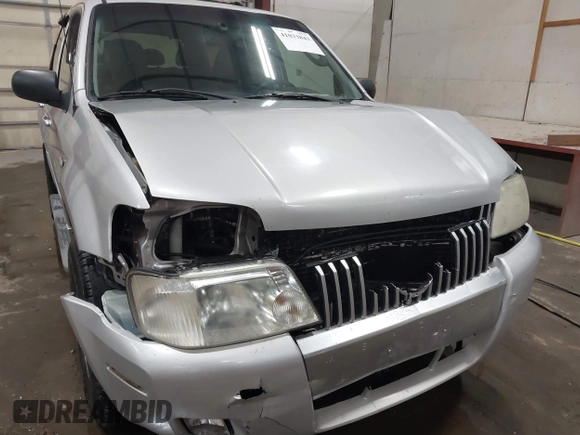 2007 Mercury Mariner Premier z VIN 4M2CU97197KJ06878, wystawiony jako IAAI lot #41033843 z przebiegiem 139 492 mil mil oraz . Historia ofert i sprzedaży dostępna na DreamBid. Obrazek 6.