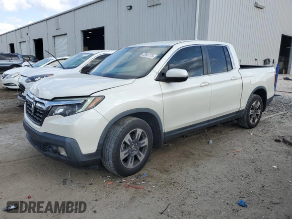 2017 Honda Ridgeline RTL-T with VIN 5FPYK2F69HB007182, listed as a Copart auction lot 52507175 with 74,956 mi miles and Salvage title. Bid and sale history available at DreamBid. Image 1.