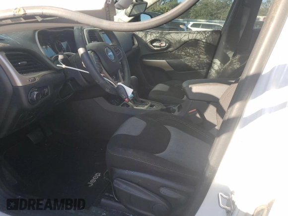 2017 Jeep Cherokee Sport z VIN 1C4PJLAS6HW652465, wystawiony jako Copart lot #77450574 z przebiegiem 16 779 mil mil oraz Szkoda całkowita • Salvage title. Historia ofert i sprzedaży dostępna na DreamBid. Obrazek 7.