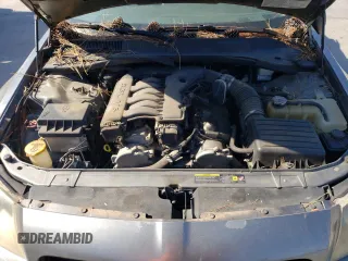 2005 Dodge Magnum SE z VIN 2D4FV48V05H190343, wystawiony jako Copart lot #75058534 z przebiegiem 180 373 mil mil oraz Szkoda całkowita • Salvage title. Historia ofert i sprzedaży dostępna na DreamBid. Obrazek 11.