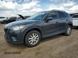 2014 Mazda CX-5 Sport z VIN JM3KE2BEXE0378937, wystawiony jako Copart lot #55063785 z przebiegiem 167 810 mil mil oraz Szkoda całkowita • Salvage title. Historia ofert i sprzedaży dostępna na DreamBid. Obrazek 1.