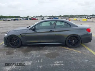 2016 BMW M4 with VIN WBS3U9C51GP968602, listed as a IAAI auction lot 42442452 with 3 mi miles and . Bid and sale history available at DreamBid. Image 14.