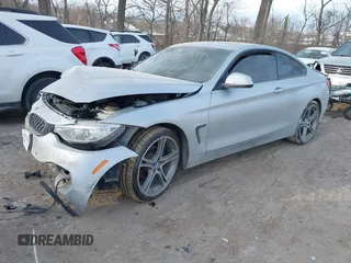 2015 BMW 4 Series 428i xDrive with VIN WBA3N9C53FK247985, listed as a IAAI auction lot 41395534 with 76,856 mi miles and . Bid and sale history available at DreamBid. Image 17.