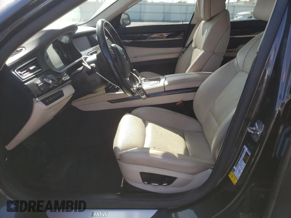 2012 BMW 7 Series 740i with VIN WBAKA4C54CC613419, listed as a Copart auction lot 54420885 with 104,006 mi miles and Salvage Title. Bid and sale history available at DreamBid. Image 7.