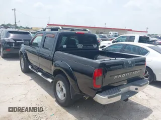 2001 Nissan Frontier SE with VIN 1N6ED27T81C305653, listed as a IAAI auction lot 42260643 with 245,547 mi miles and . Bid and sale history available at DreamBid. Image 3.
